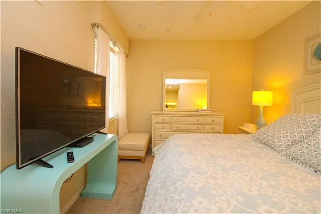 a bedroom with a bed and a closet