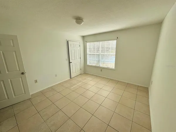 a kitchen with sink cabinets and stove