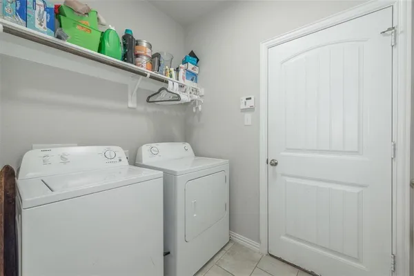 an empty room with white walls and white walls