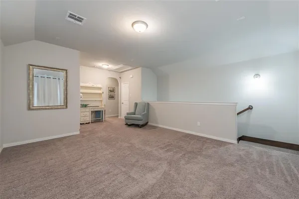 an empty room with a empty space and a window