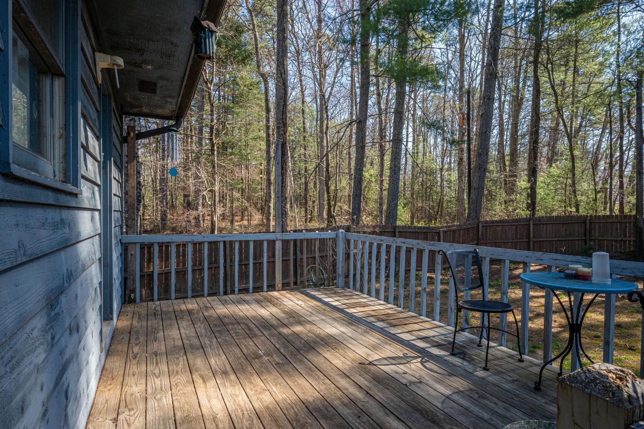 2 Laurel Brook Drive Flat Rock, NC 28731 - Photo 12 of 32 a view of balcony with wooden floor and outdoor seating
