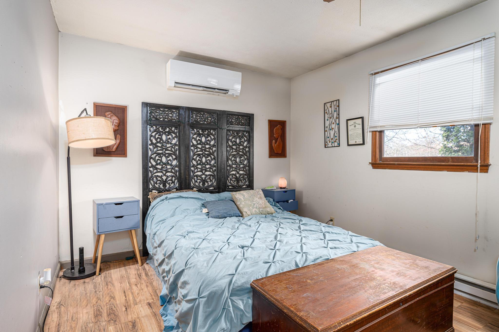 2 Laurel Brook Drive Flat Rock, NC 28731 - Photo 15 of 32 a bedroom with a bed and a table in it