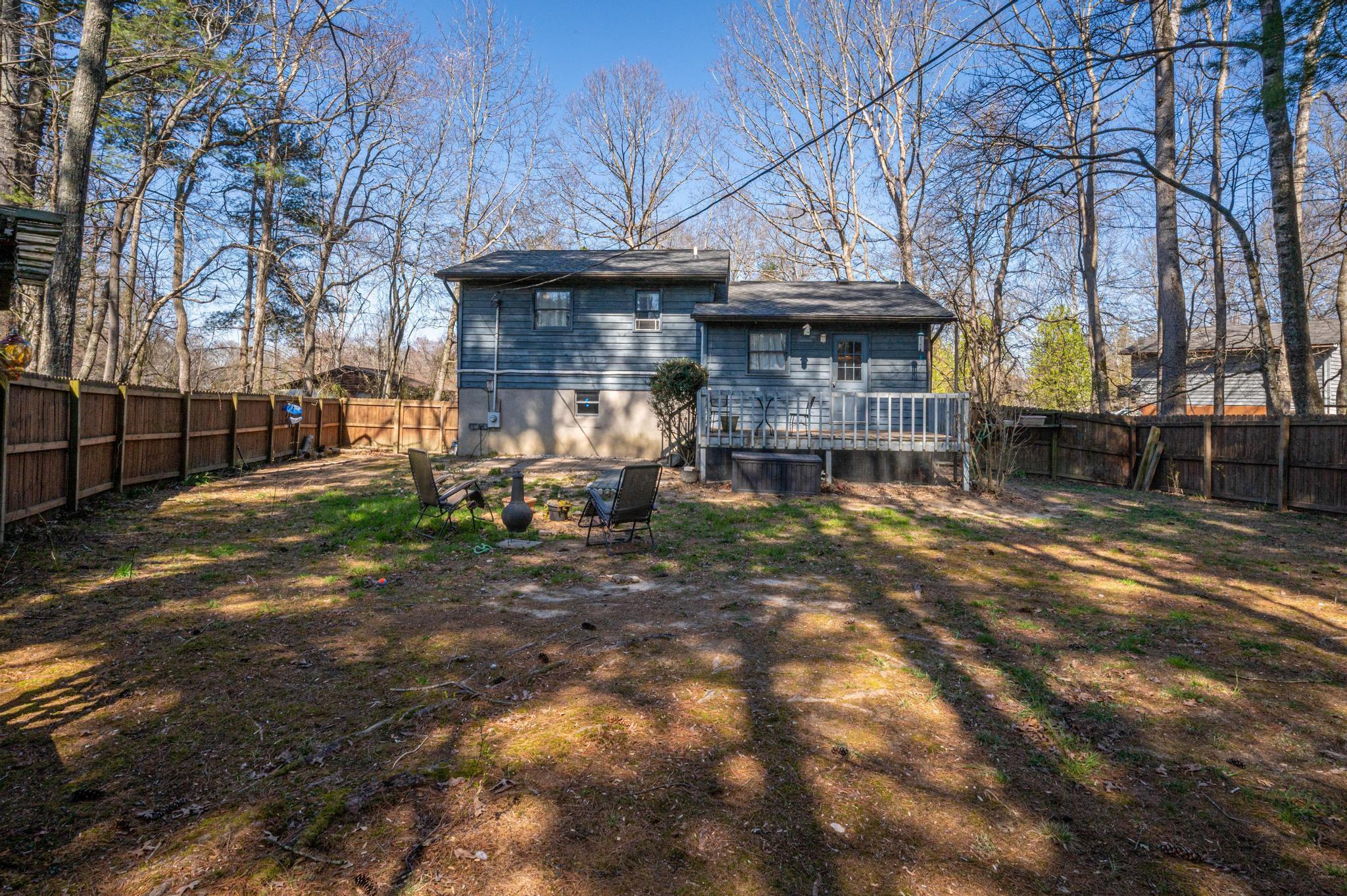 2 Laurel Brook Drive Flat Rock, NC 28731 - Photo 26 of 32 a view of a chairs and tables in the patio
