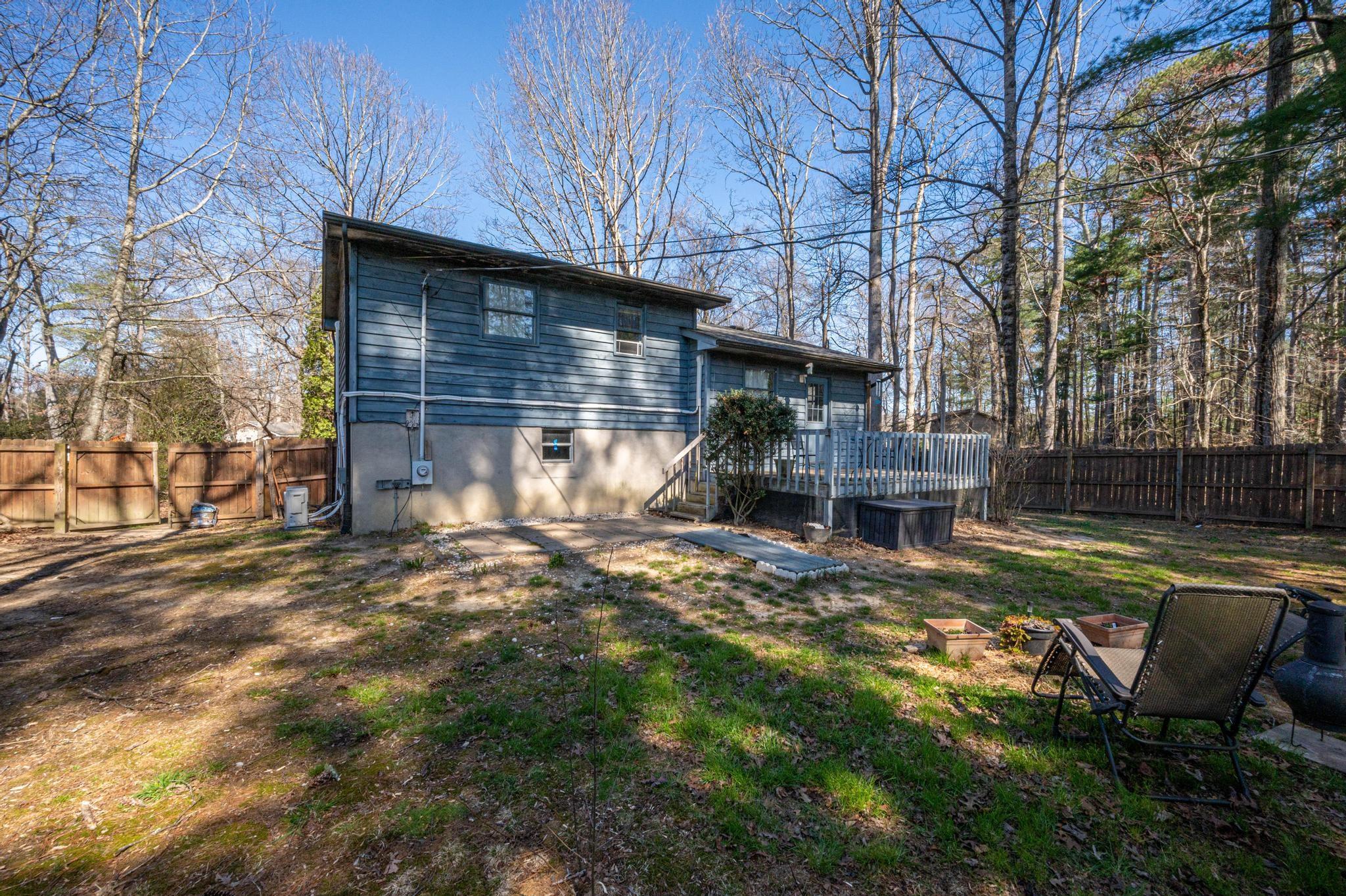 2 Laurel Brook Drive Flat Rock, NC 28731 - Photo 27 of 32 a view of a house with backyard and sitting area