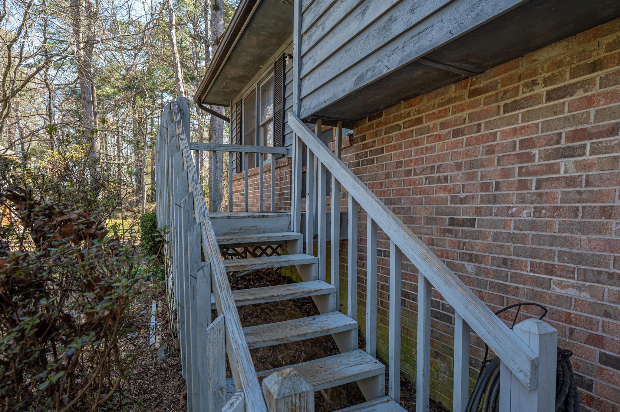 2 Laurel Brook Drive Flat Rock, NC 28731 - Photo 6 of 32 a view of entryway with wooden floor and stairs