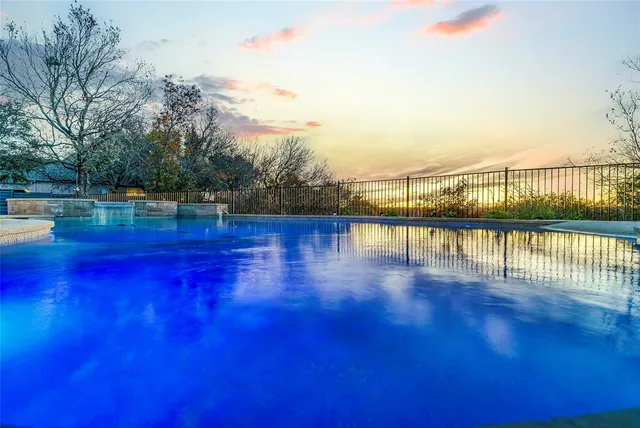 a view of a lake with a big yard