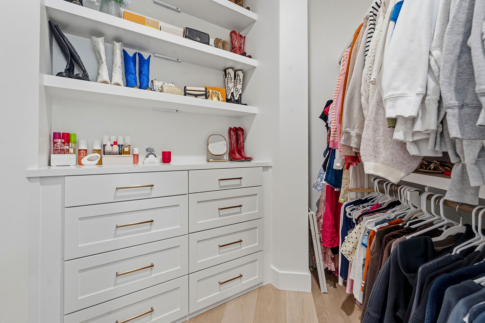 11501 Turtle Lane Austin, TX 78726 - Photo 28 of 37 a view of walk in closet with clothes and shoes