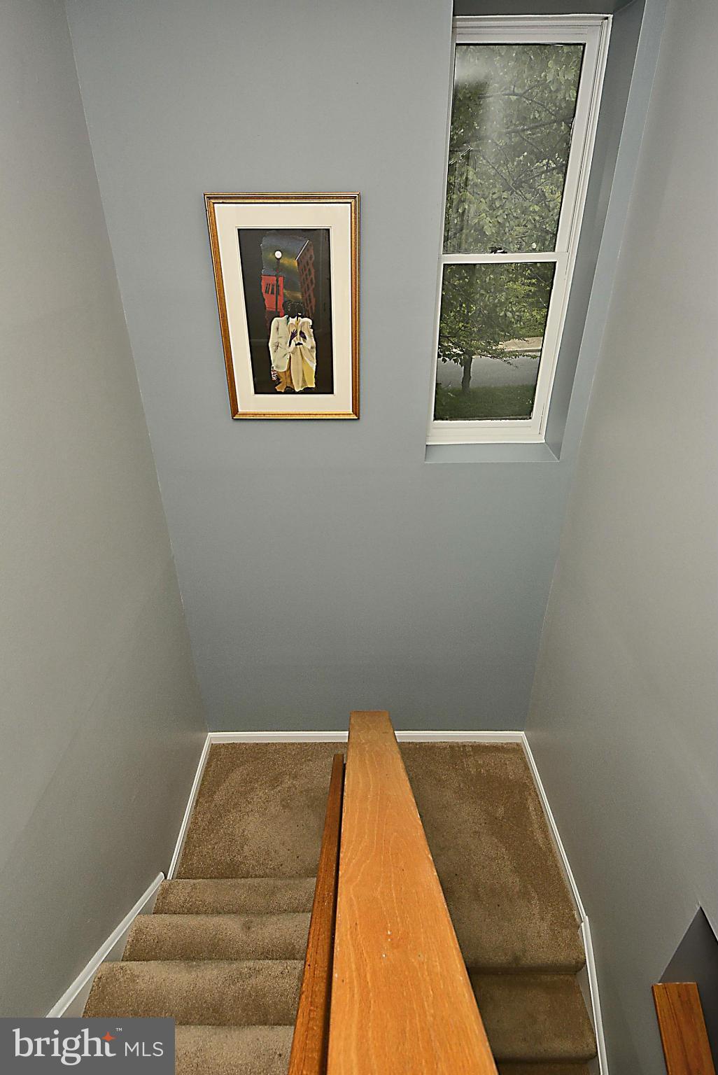 5890 Pimlico Road Baltimore, MD 21209 - Photo 5 of 30 staircase to upper level