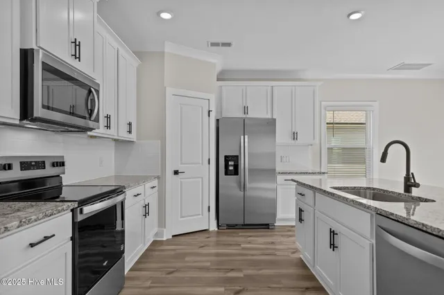 $403,900 | 70 Umbrella Palm Drive, Hampstead, NC 28443