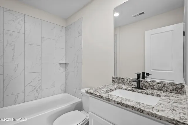 $403,900 | 70 Umbrella Palm Drive, Hampstead, NC 28443