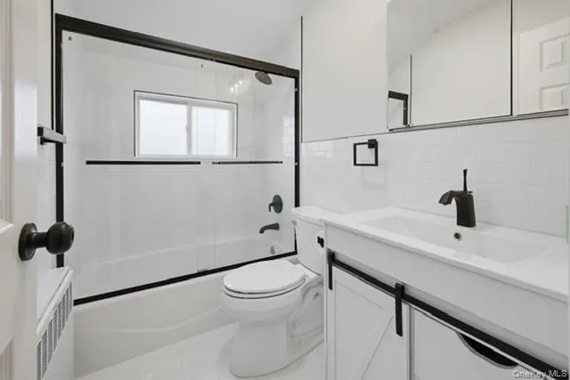 a view of staircase with white walls