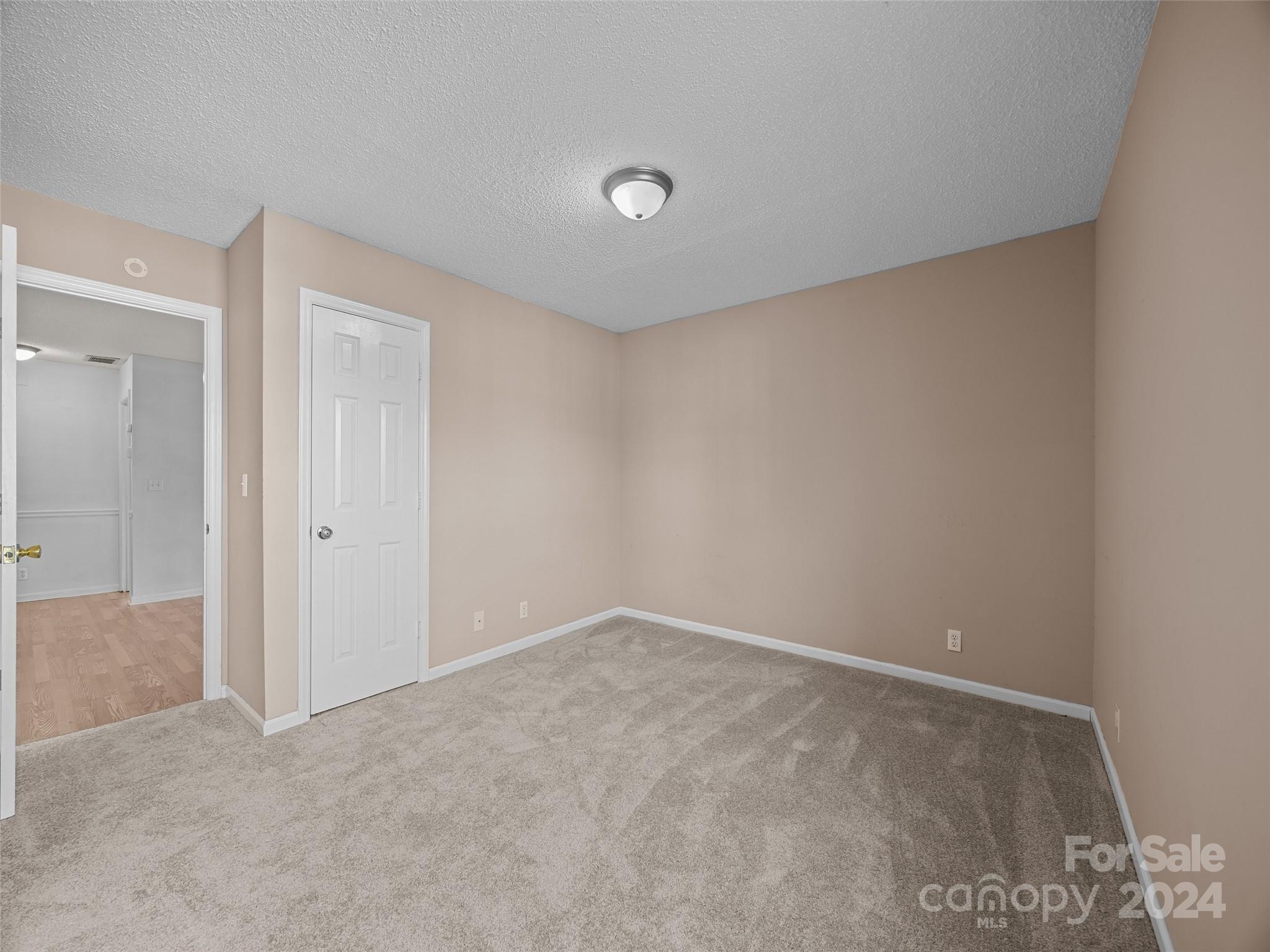 110 Heywood Road, Unit 14D Arden, NC 28704 - Photo 16 of 20 a view of an empty room