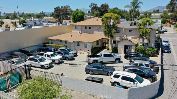 a view of a patio with couches table and chairs