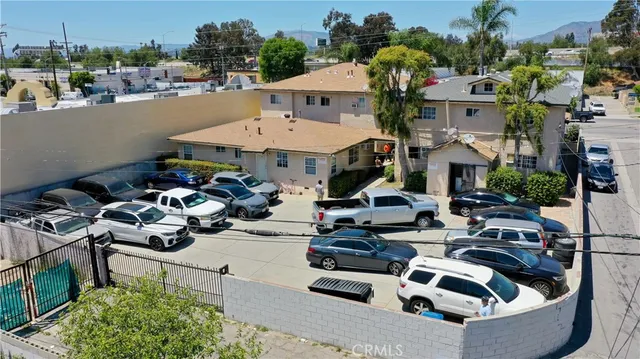 a view of a patio with couches table and chairs