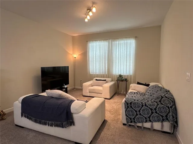 a view of a room with a baby crib