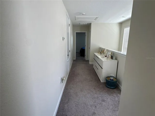 a bathroom with a sink double vanity and a mirror