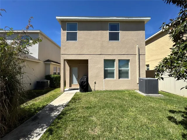a view of a park with swings