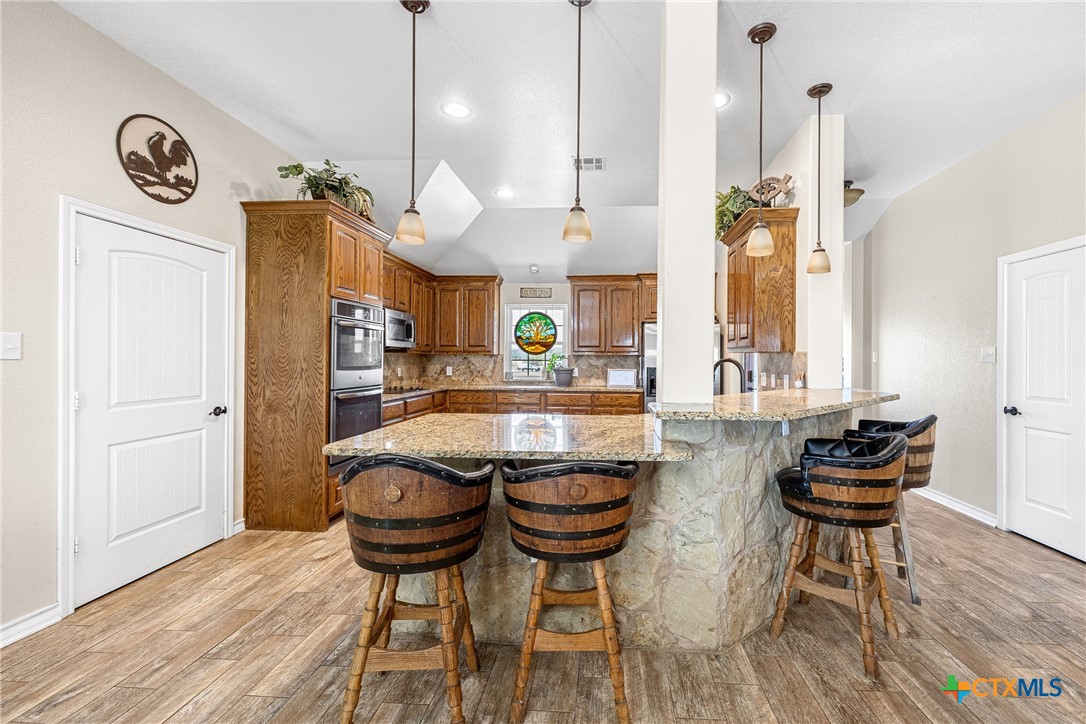 16101 Dove Road Moody, TX 76557 - Photo 12 of 42 a kitchen with a table and chairs in it