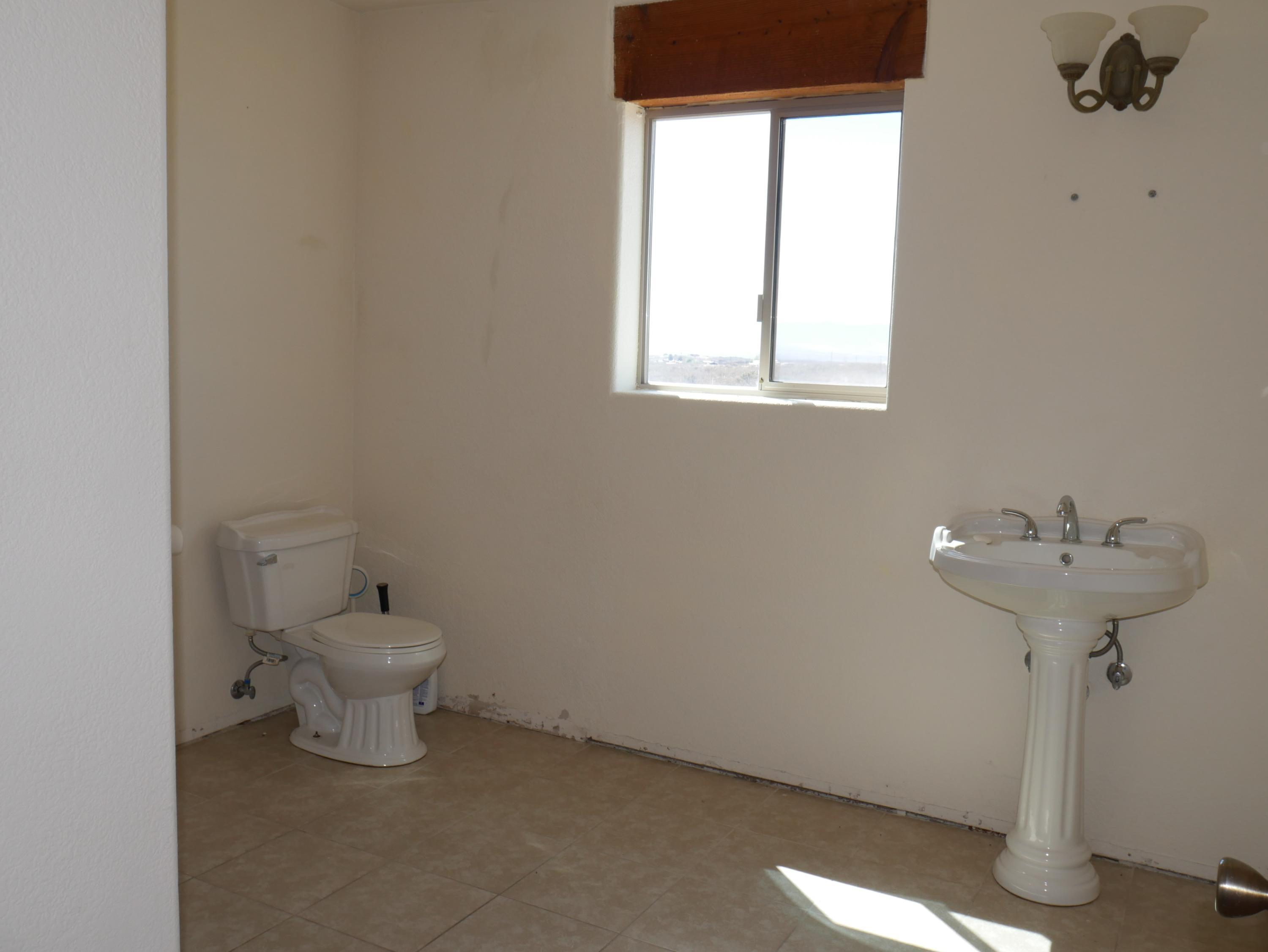 1916 North Middlemarch Road Tombstone, AZ 85638 - Photo 26 of 37 Hallway Bathroom