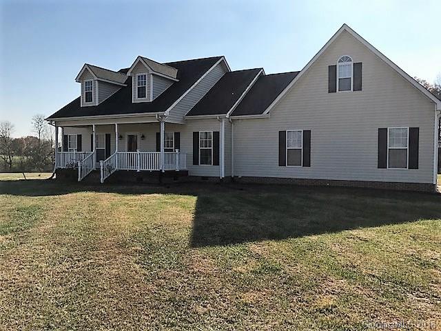 211 Trinity Church Road Monroe, NC 28112 - Photo 1 of 27 a front view of a house with a yard