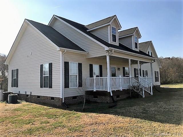 211 Trinity Church Road Monroe, NC 28112 - Photo 2 of 27 a front view of a house with a yard
