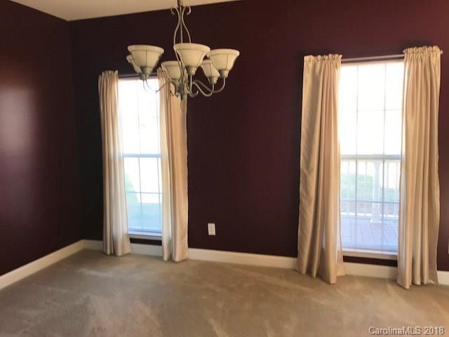 211 Trinity Church Road Monroe, NC 28112 - Photo 14 of 27 a view of an empty room with a window
