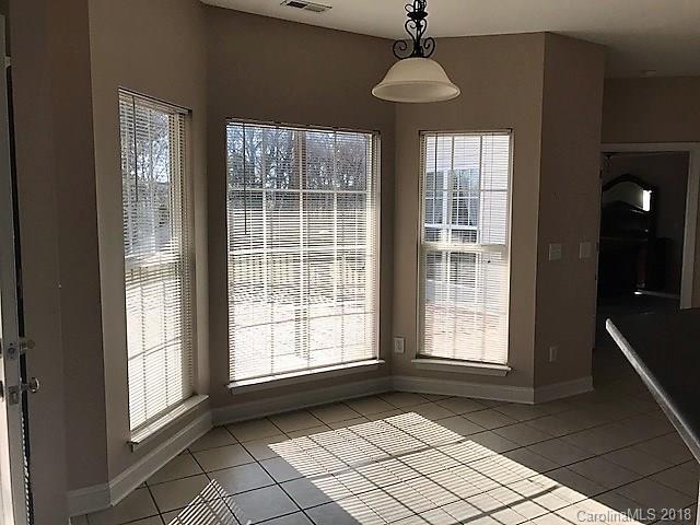 211 Trinity Church Road Monroe, NC 28112 - Photo 15 of 27 a view of an empty room with glass door