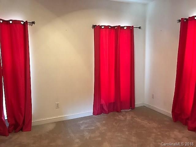 211 Trinity Church Road Monroe, NC 28112 - Photo 24 of 27 a view of a room with red walls