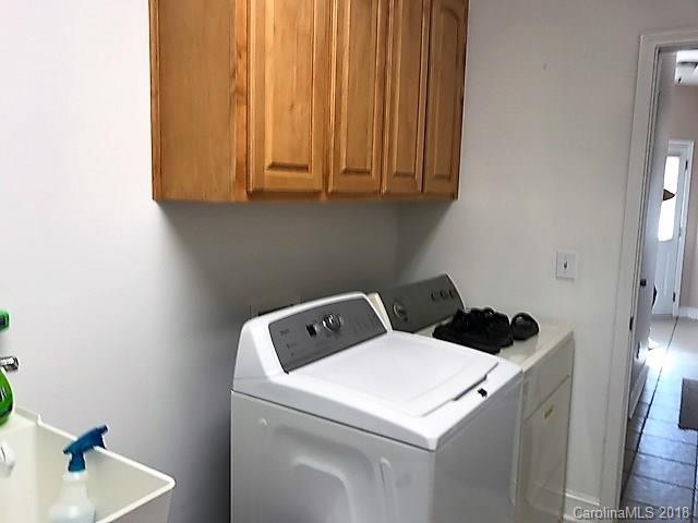 211 Trinity Church Road Monroe, NC 28112 - Photo 26 of 27 a utility room with dryer and washer