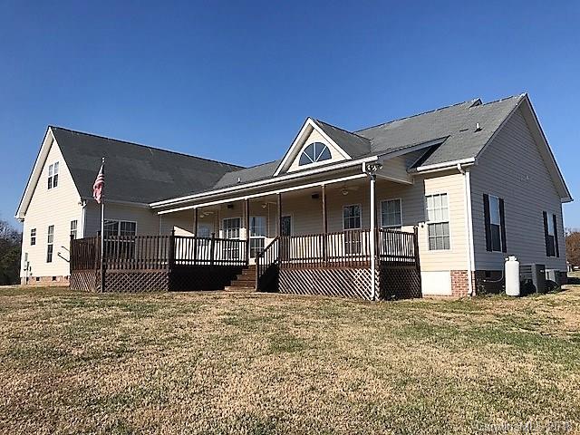 211 Trinity Church Road Monroe, NC 28112 - Photo 4 of 27 a front view of a house with a yard