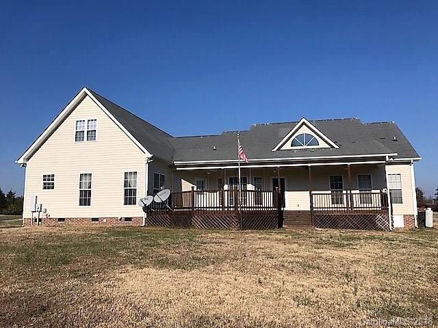 211 Trinity Church Road Monroe, NC 28112 - Photo 5 of 27 a view of a house with a yard