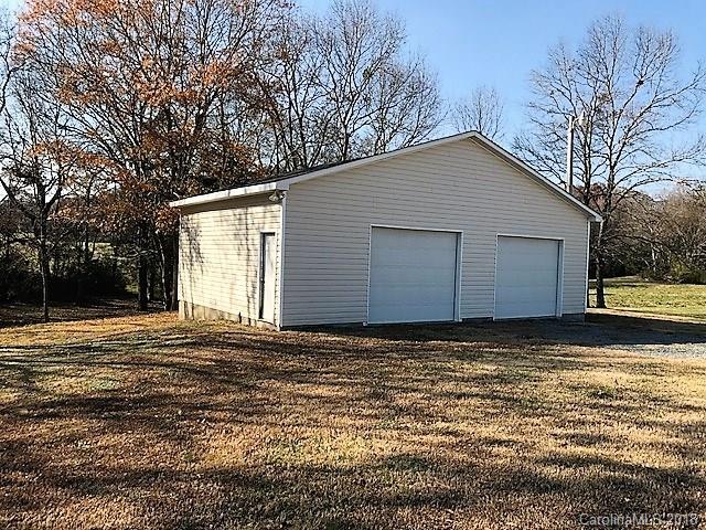 211 Trinity Church Road Monroe, NC 28112 - Photo 6 of 27 a view of a house with a yard