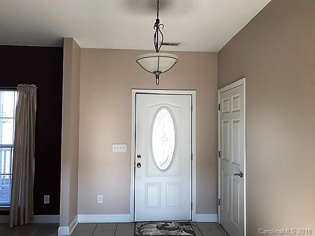 211 Trinity Church Road Monroe, NC 28112 - Photo 7 of 27 a view of a hallway with a elevator