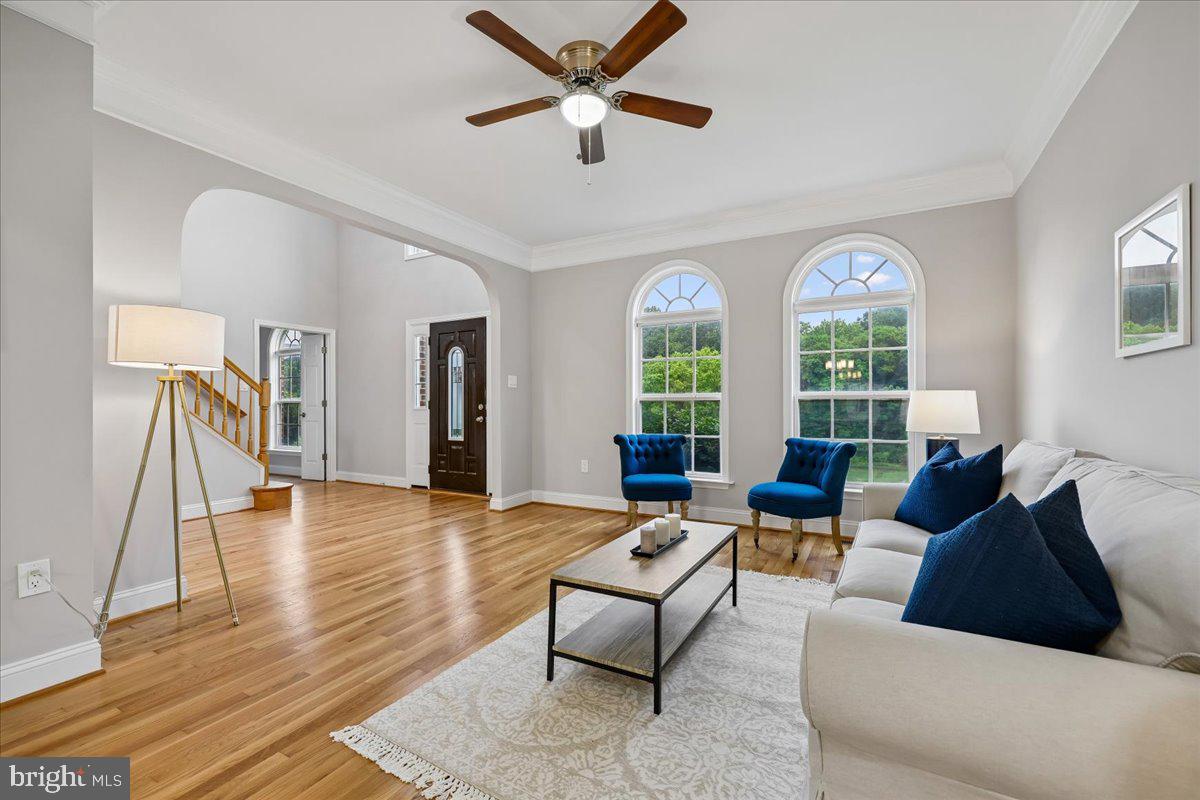21712 Slidell Road Boyds, MD 20841 - Photo 8 of 32 a living room with furniture and a large window
