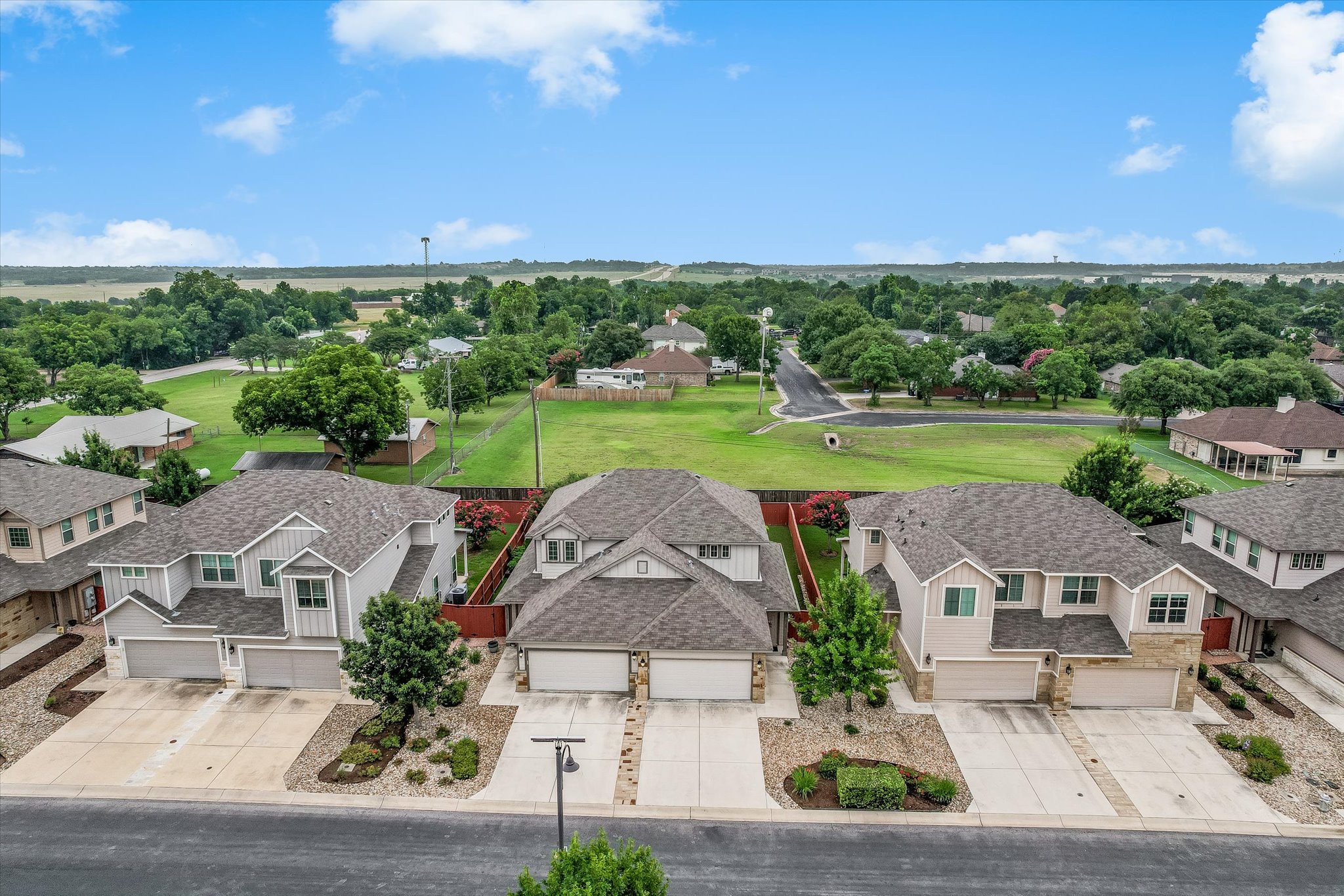 528 High Tech Drive Georgetown, TX 78626 - Photo 2 of 29 Backs to a green area owned by the City of Georgetown.