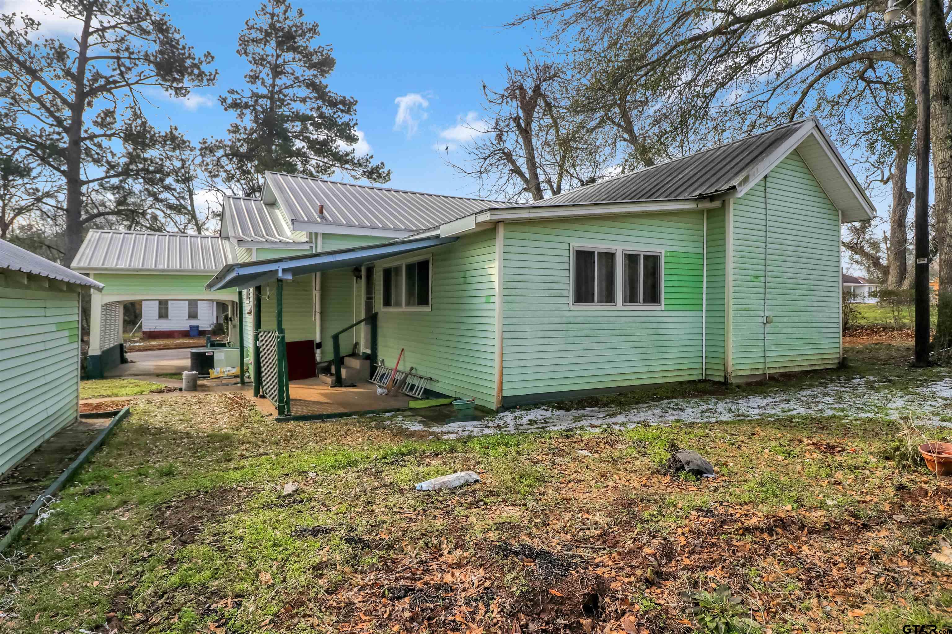 205 East 4th Street Rusk, TX 75785 - Photo 21 of 23 a view of a house with a yard