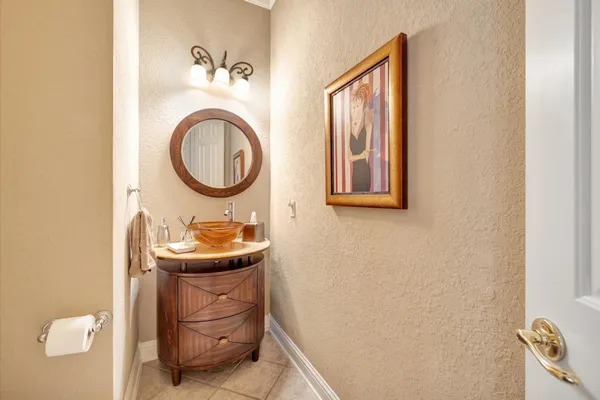 a bathroom with a shower a toilet and a sink