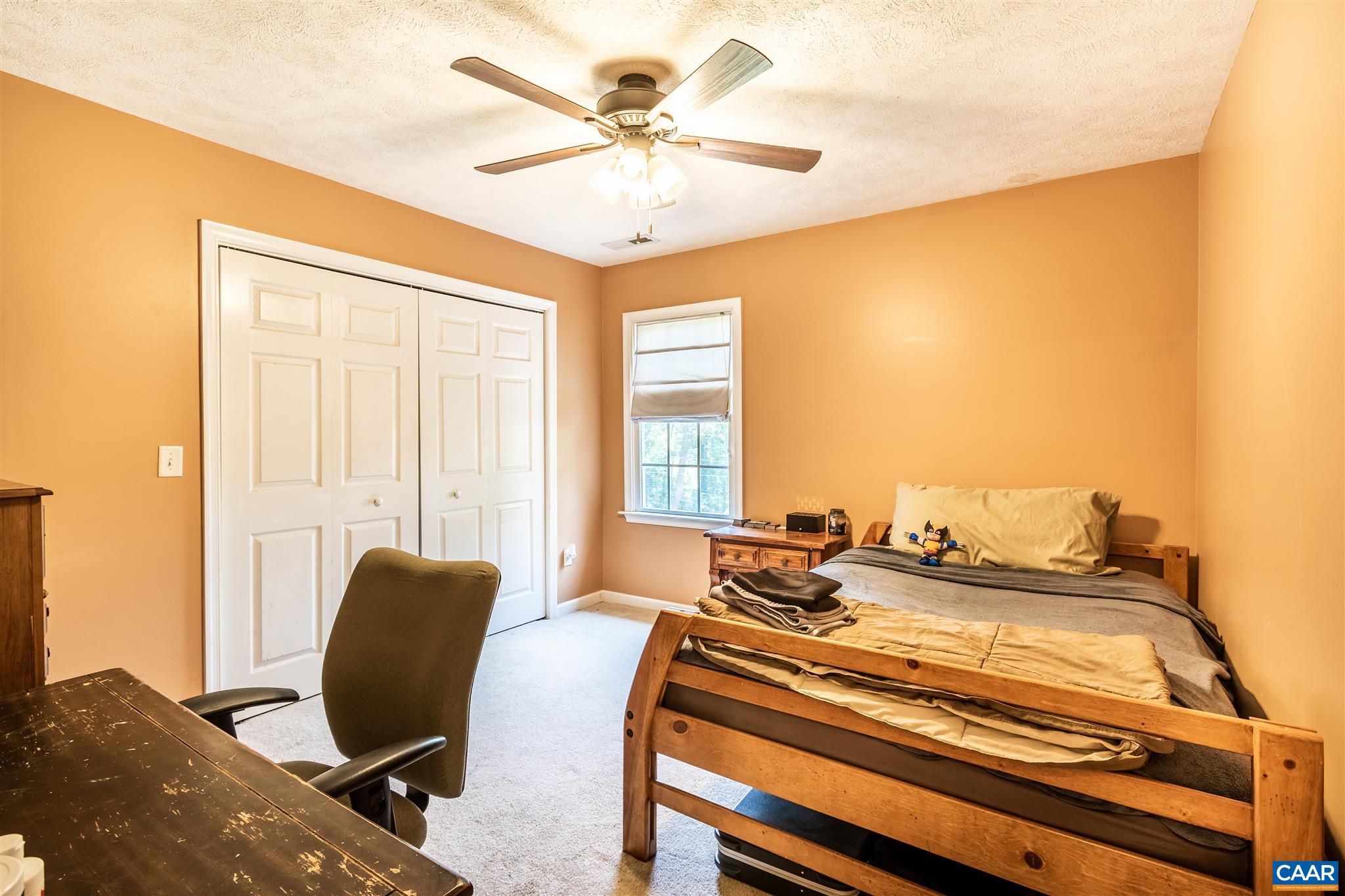 196 Logtrac Road Stanardsville, VA 22973 - Photo 24 of 34 a view of a workspace with furniture and a window