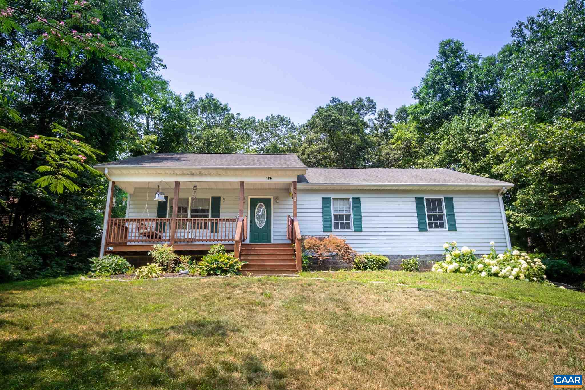 196 Logtrac Road Stanardsville, VA 22973 - Photo 4 of 34 a front view of house with yard and green space