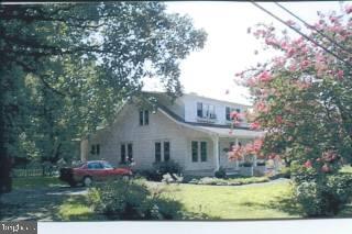 27659 Mt Vernon Road Princess Anne, MD 21853 - Photo 1 of 1 front view of house with a yard