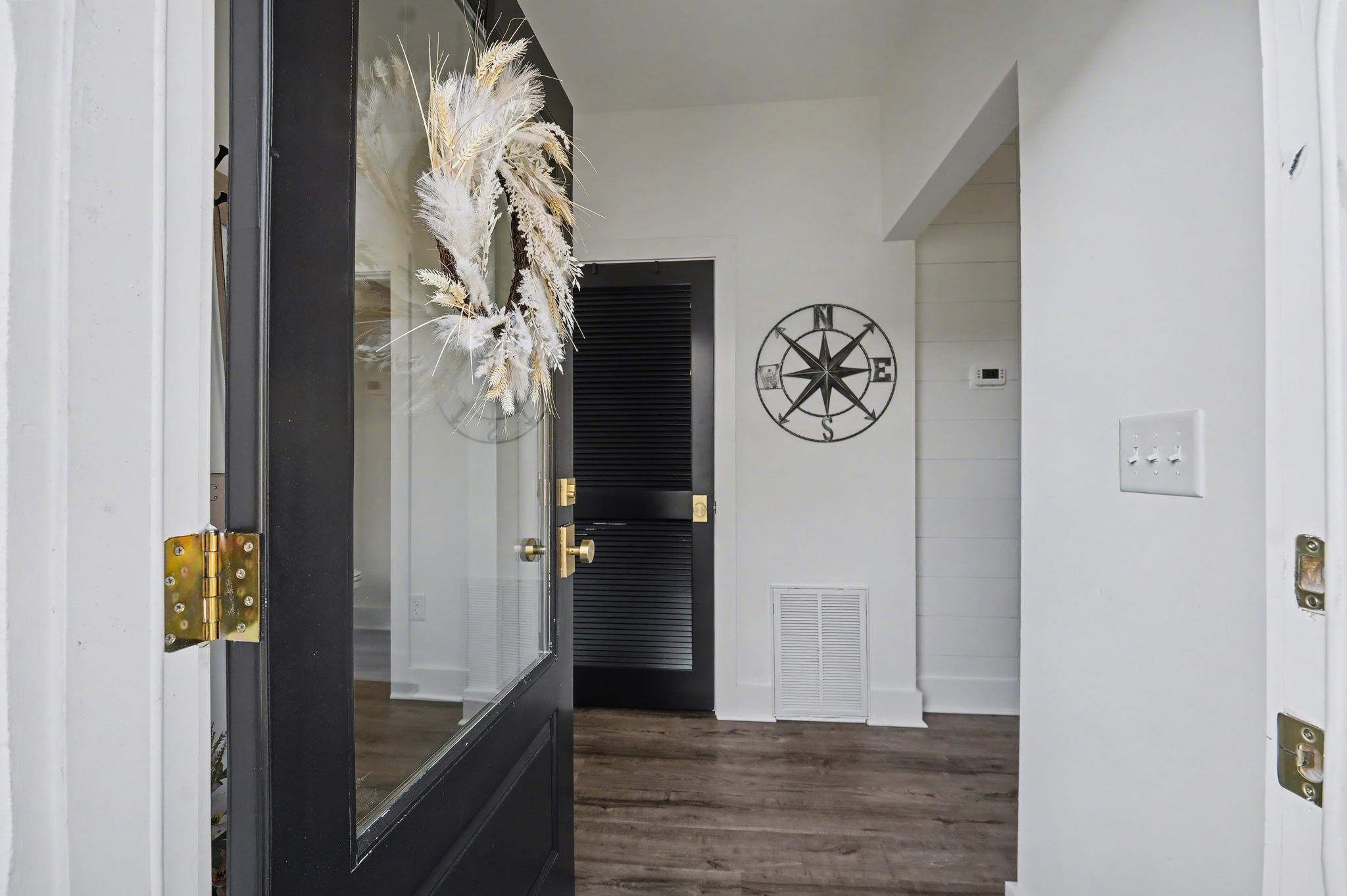 236 Brown Pelican Loop Pawleys Island, SC 29585 - Photo 14 of 38 Foyer with dark wood-style floors