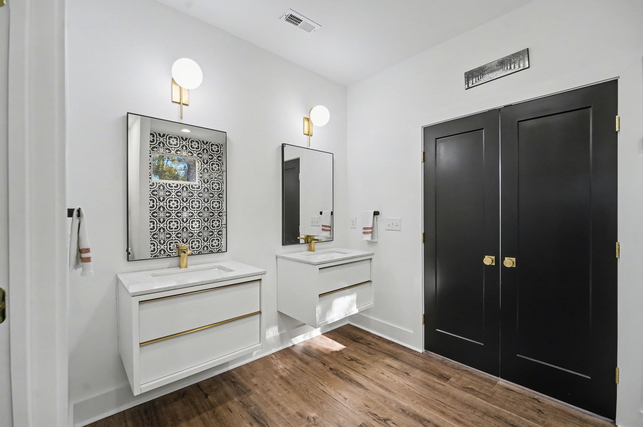236 Brown Pelican Loop Pawleys Island, SC 29585 - Photo 28 of 38 Bathroom with two floating vanities