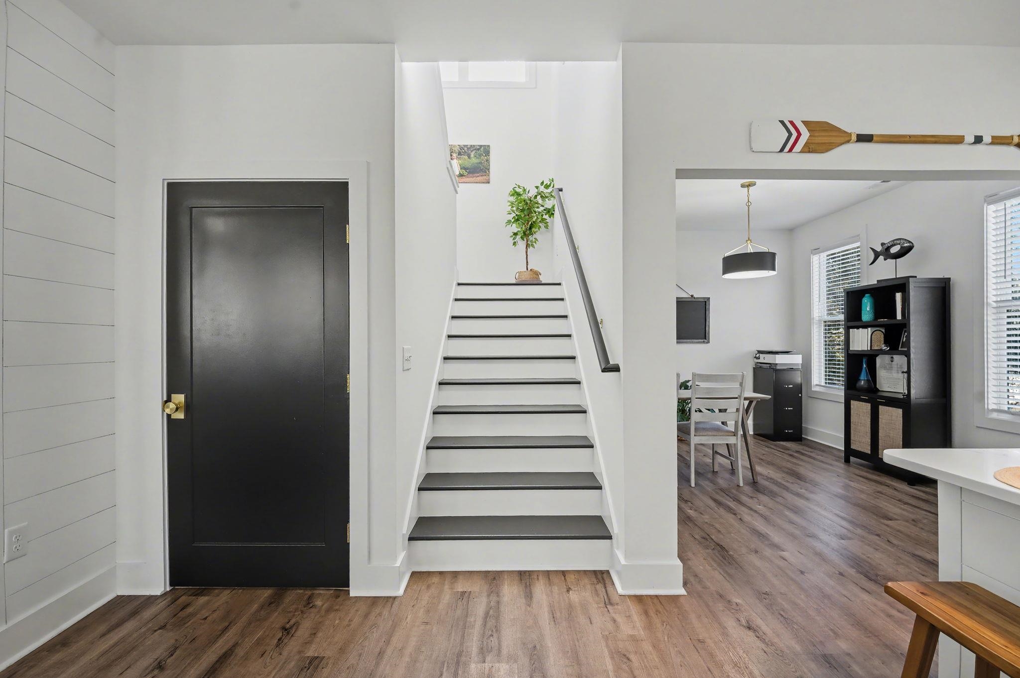 236 Brown Pelican Loop Pawleys Island, SC 29585 - Photo 30 of 38 Stairway featuring wood finished floors and baseboards