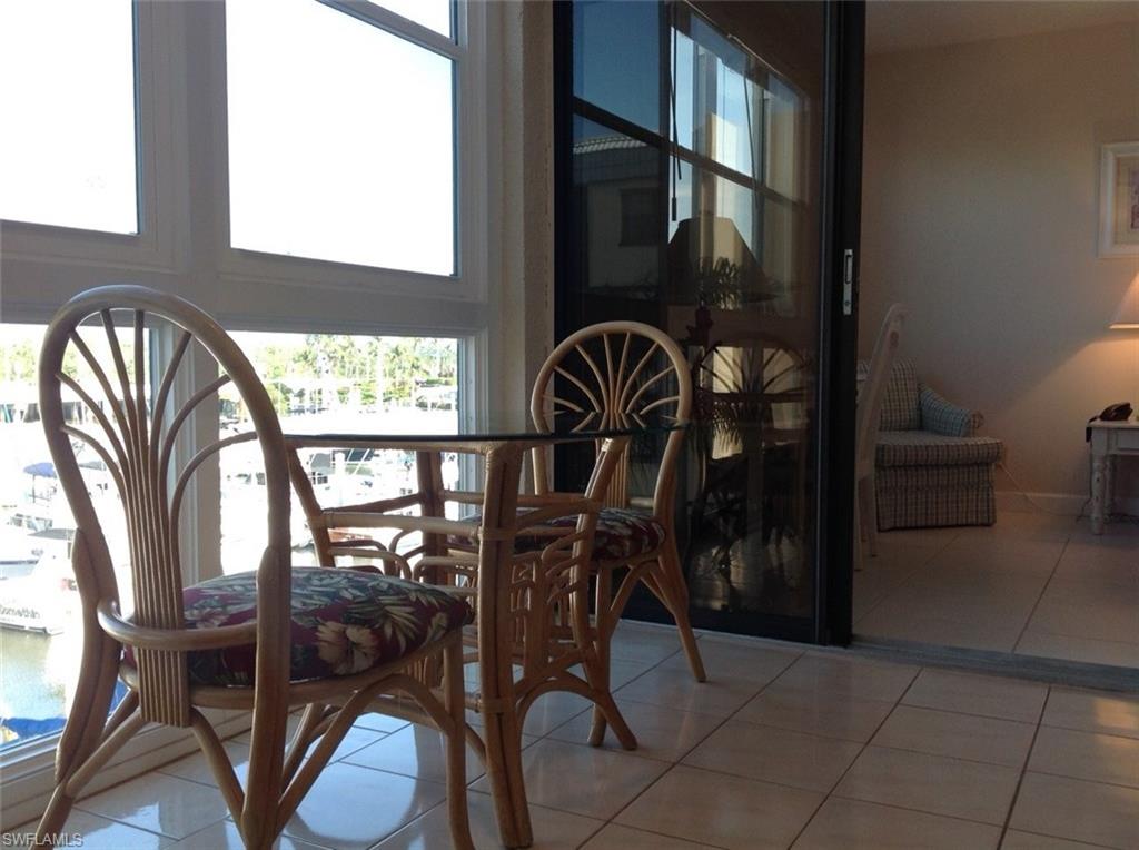 803 River Point Drive, Unit 202B Naples, FL 34102 - Photo 20 of 24 a view of a entryway with seating area