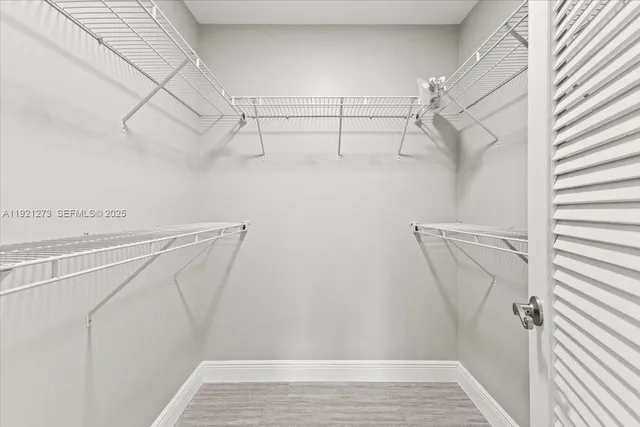 a view of a room with racks on the wall