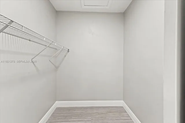 a view of a room with racks on the wall