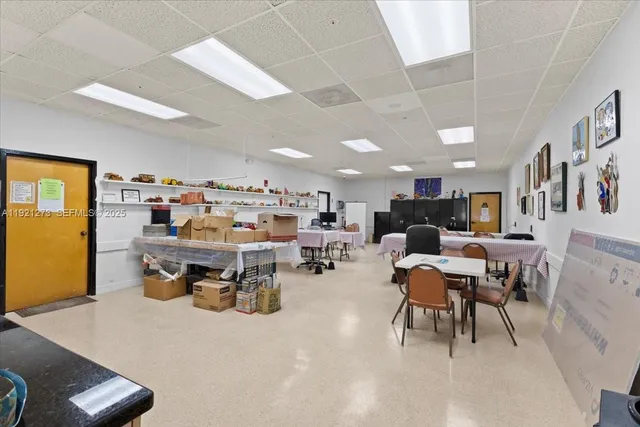 a room with lots of furniture and clutter