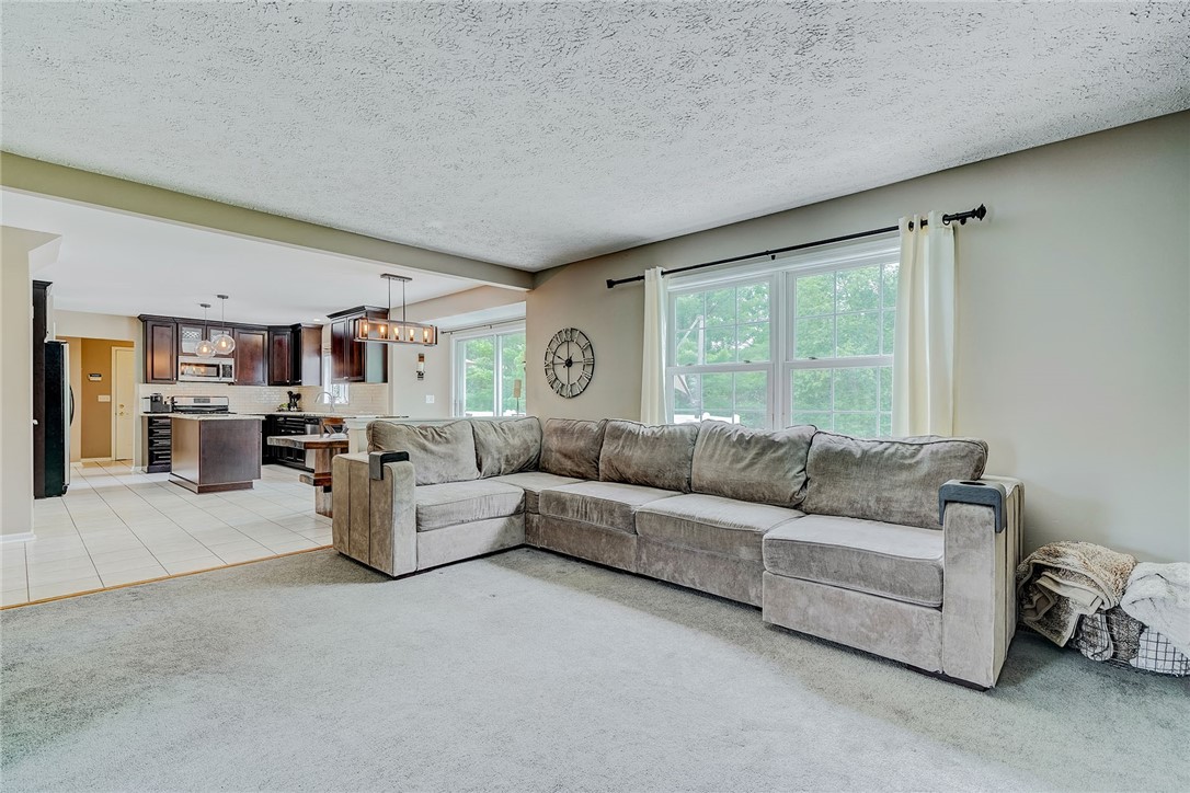 809 Lindsey Circle Webster, NY 14580 - Photo 12 of 50 FAMILY ROOM VIEW TO THE KITCHEN . . .