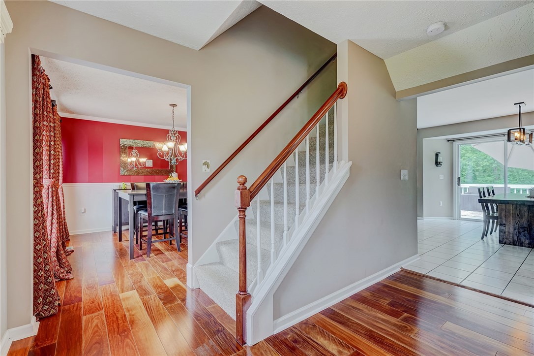809 Lindsey Circle Webster, NY 14580 - Photo 3 of 50 FOYER/ENTRY WITH GORGEOUS "BRAZILIAN" CHERRY HARDW