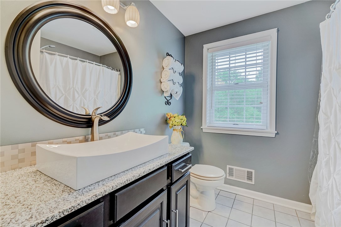 809 Lindsey Circle Webster, NY 14580 - Photo 31 of 50 MAIN BATH WITH TILE FLOOR, NEW VANITY, LIGHTING, S